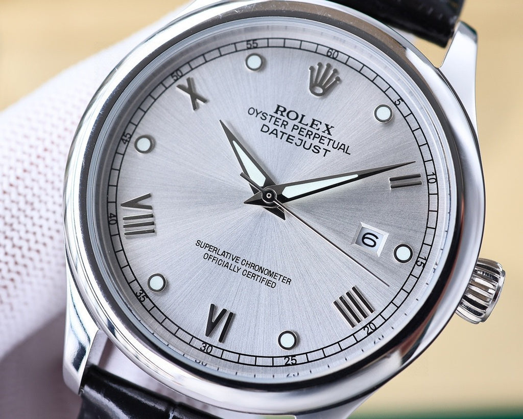 Rolex Datejust watch close-up, silver dial with Roman numerals and date at 6