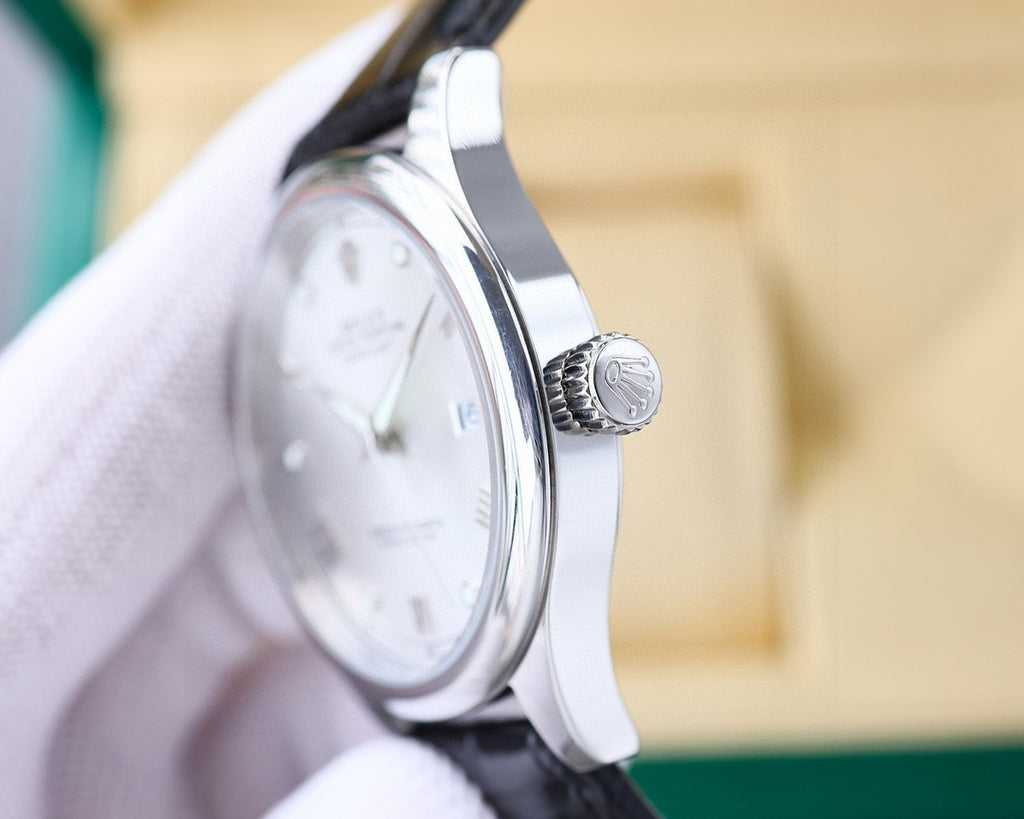 Rolex Datejust watch side view, black leather strap, steel case and crown