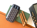 Small Goyard patterned pouch bag with navy leather trim and top zip