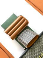 Goyard bag with Goyardine patterned pouch and tan leather organizer, open view