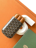 Goyard canvas bag with Goyardine pattern, tan leather trim, open compartments