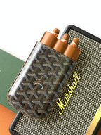 Goyard canvas bag with Goyardine pattern front and tan leather pockets, logo side detail