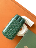 Goyard green patterned card holder with leather trim and snap strap
