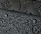 Louis Vuitton monogram embossed leather with star and logo pattern panel