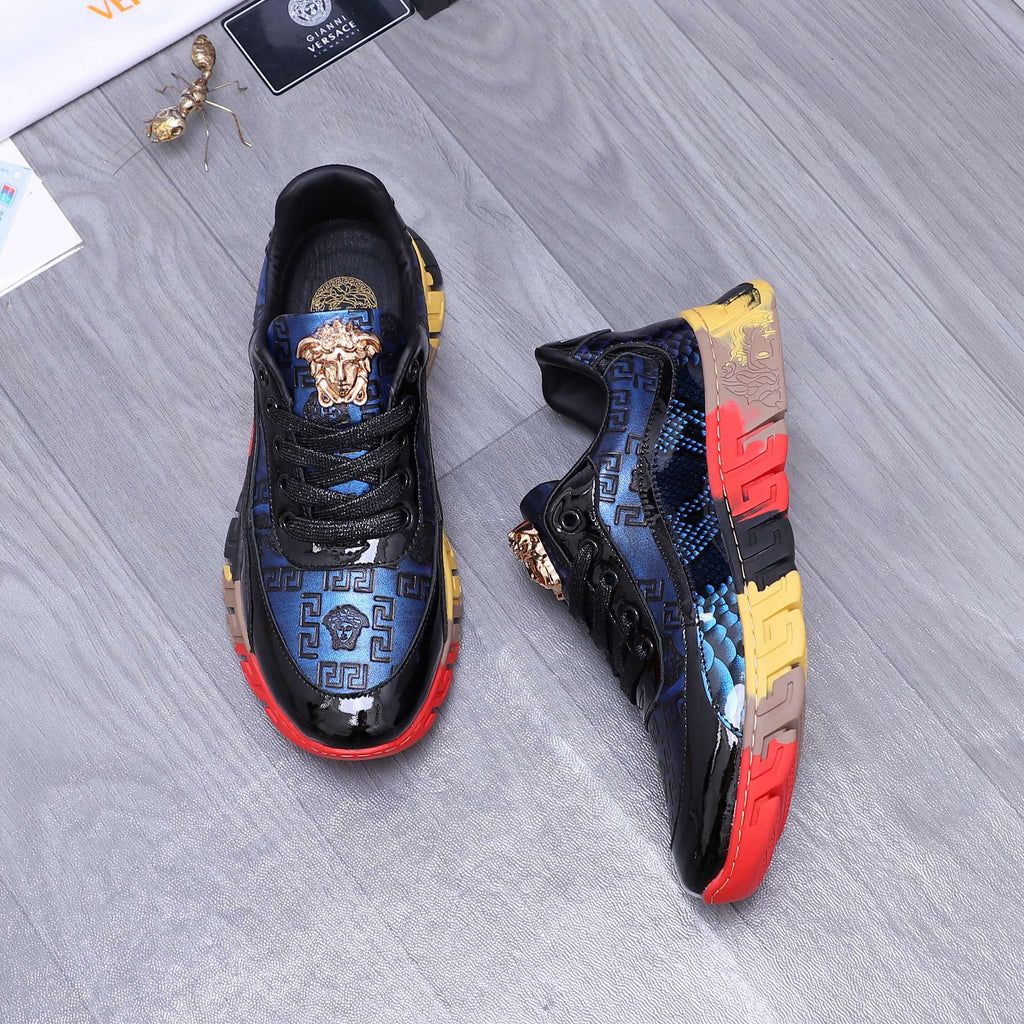 Low-top athletic sneakers, black with blue pattern and multicolor block sole