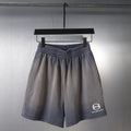 Balenciaga drawstring shorts, dark gray, elastic waistband, front view