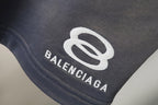 Balenciaga patch logo on dark gray shorts leg