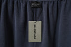 Balenciaga inner waistband label on dark gray shorts