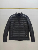 Moncler long dark puffer jacket with zip front and stand collar
