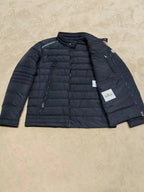 Moncler long dark puffer jacket with inner pocket panel and zip front