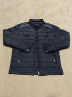 Moncler long dark puffer jacket with stand collar, zip front, quilted panels