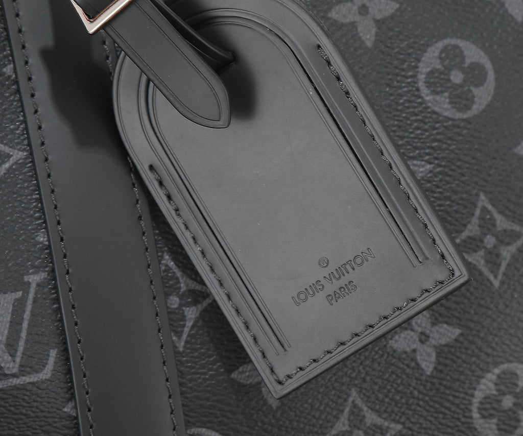 Men's Louis Vuitton monogram duffel bag close-up of stitched interior card slot