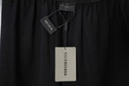Black Balenciaga shorts with drawstring waist and hanging size tag