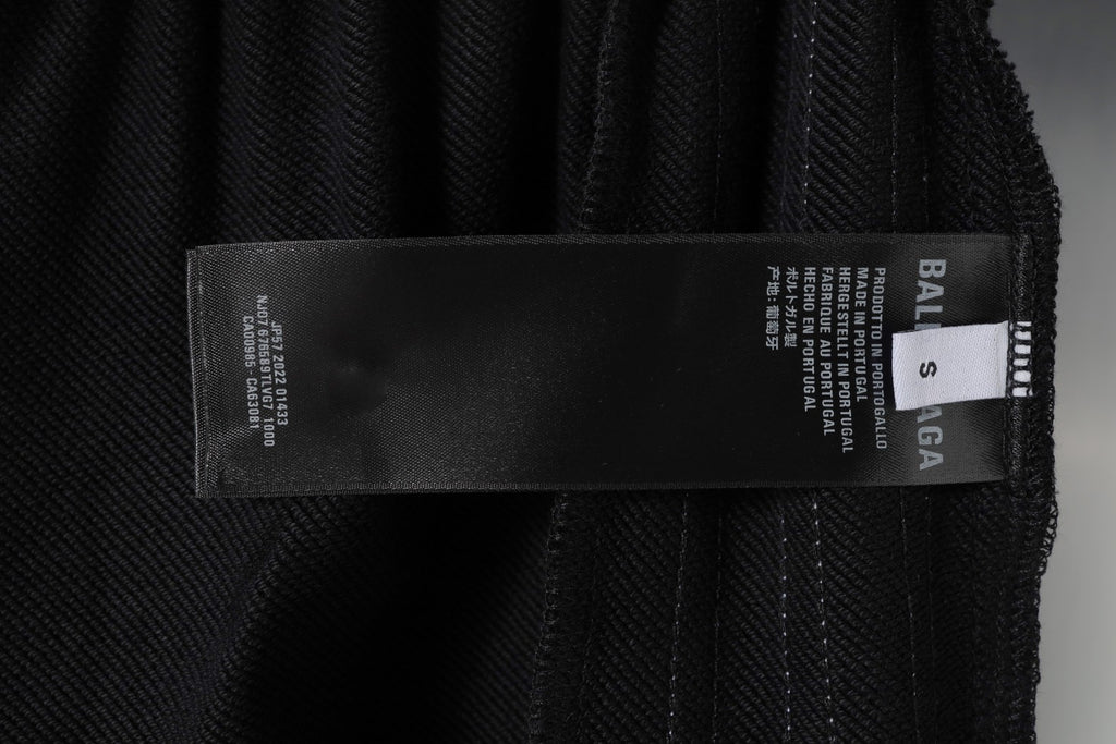 Balenciaga size label 'S' on black shorts fabric