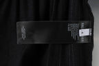 Balenciaga size label 'S' on black shorts fabric