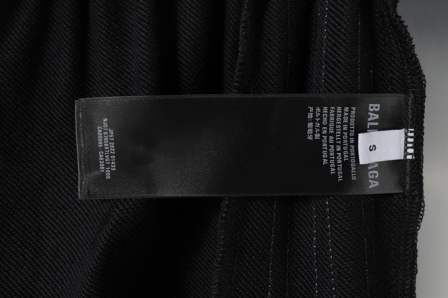 Balenciaga size label 'S' on black shorts fabric