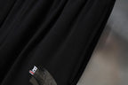 Balenciaga black shorts with embroidered logo detail on fabric