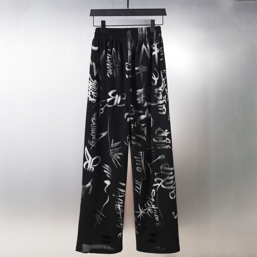 Black wide-leg pants with allover white signature-style graphic print