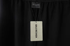 Balenciaga interior size label on black shorts waistband
