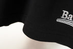 Balenciaga logo and stitched hem on black shorts