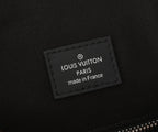 Monogram backpack leather patch reading “LOUIS VUITTON PARIS made in France”