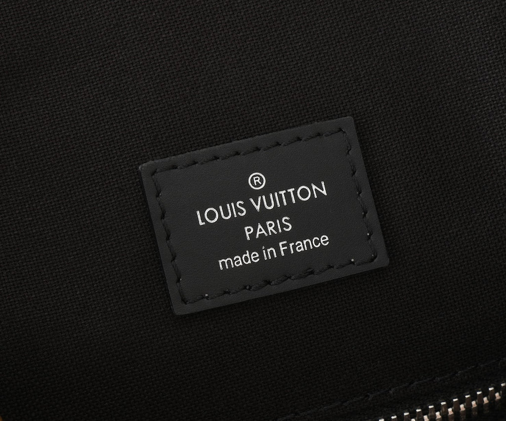 Louis Vuitton interior label reading “LOUIS VUITTON PARIS” and “made in France”.