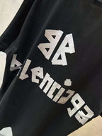 Balenciaga black short-sleeve T-shirt close-up of white logo lettering