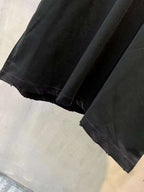 Black short-sleeve T-shirt hem and sleeve cuff detail