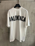 White short-sleeve T-shirt with Balenciaga logo print across chest