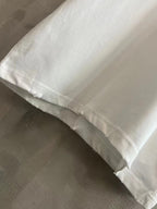 White T-shirt with straight hem and slightly frayed edge detail
