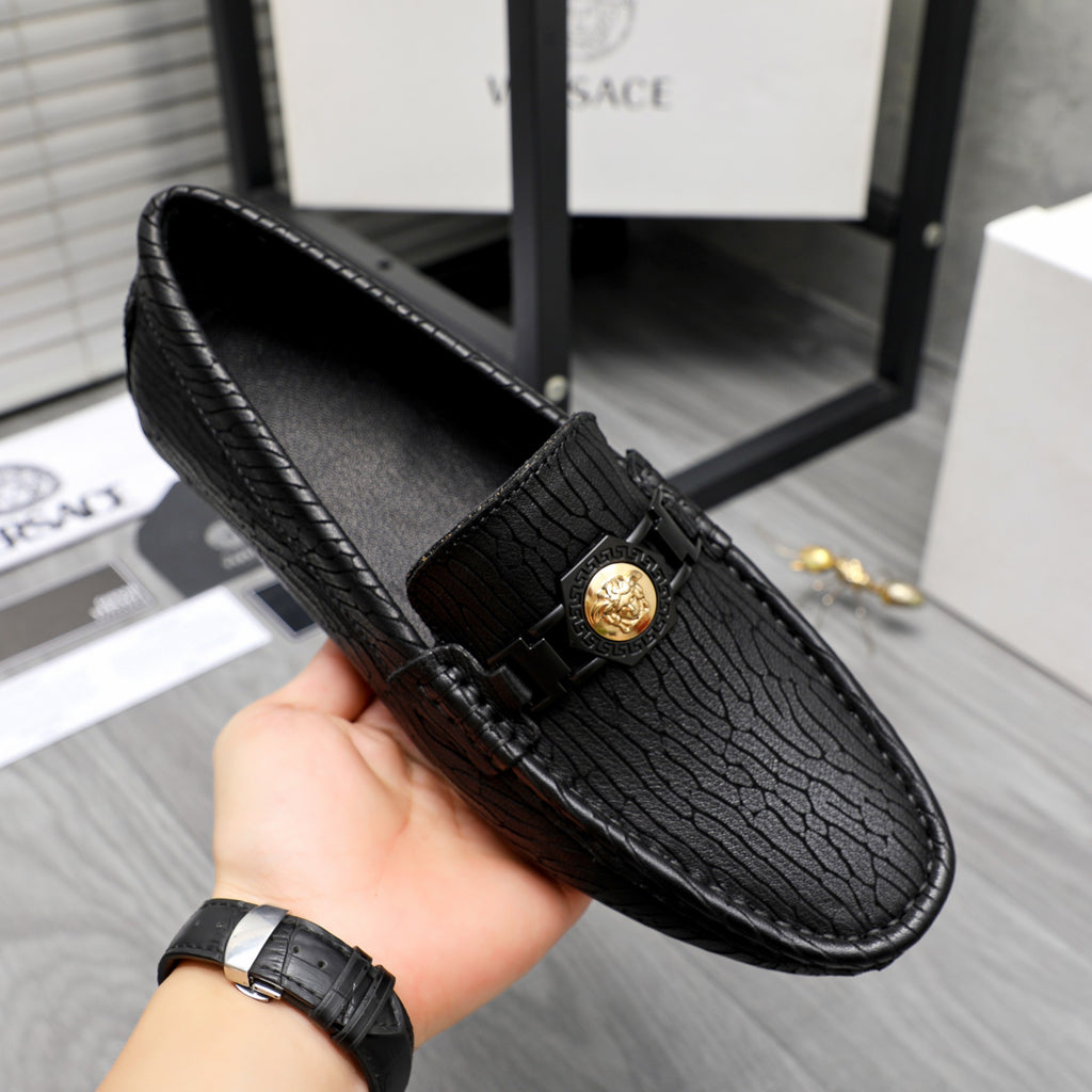 Versace luxury loafer, black embossed leather with gold buckle, interior shown