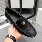 Versace luxury loafer, black embossed leather with gold buckle, interior shown