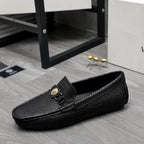 Versace luxury loafer, black embossed leather, gold buckle on strap