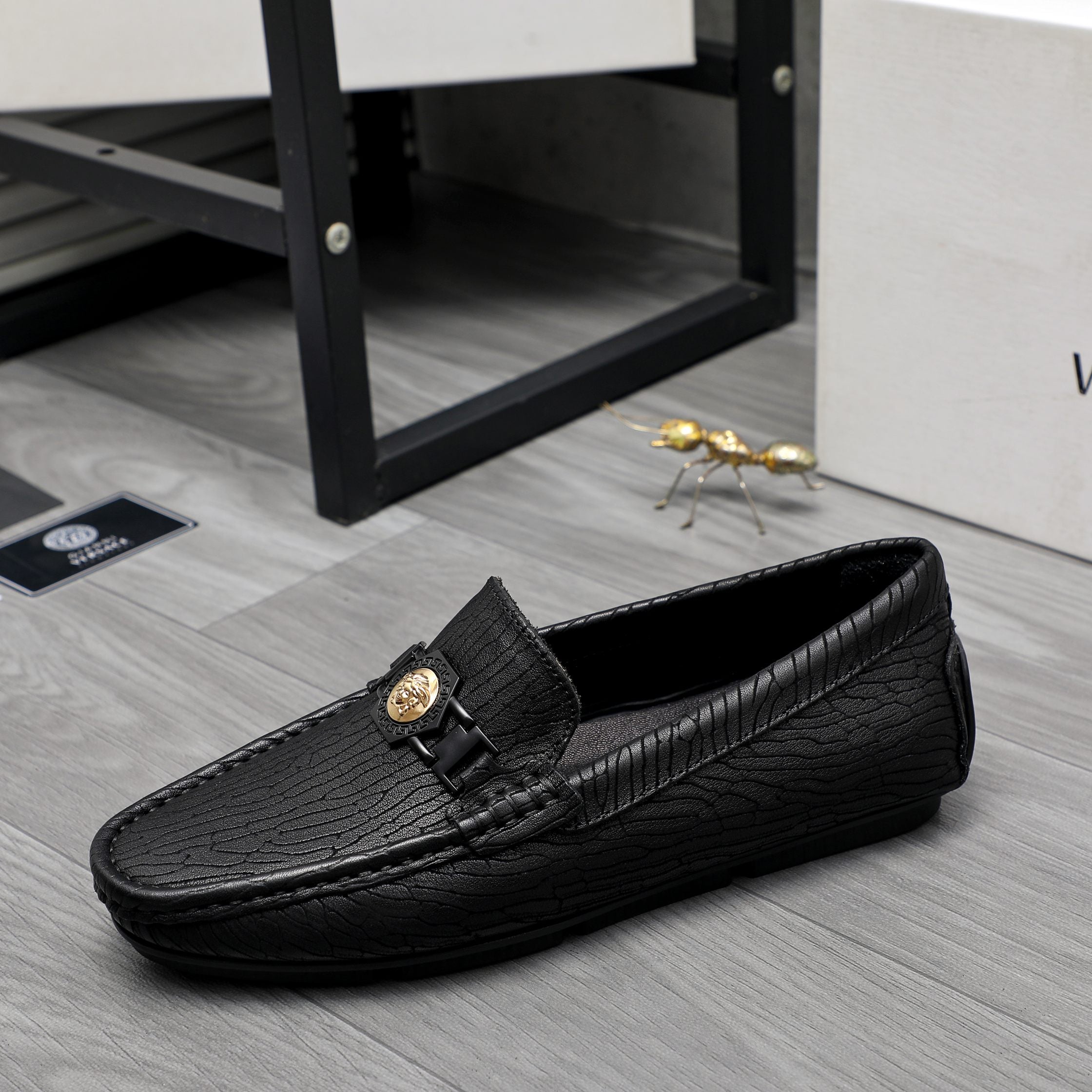 Versace luxury loafer, black embossed leather, gold buckle on strap