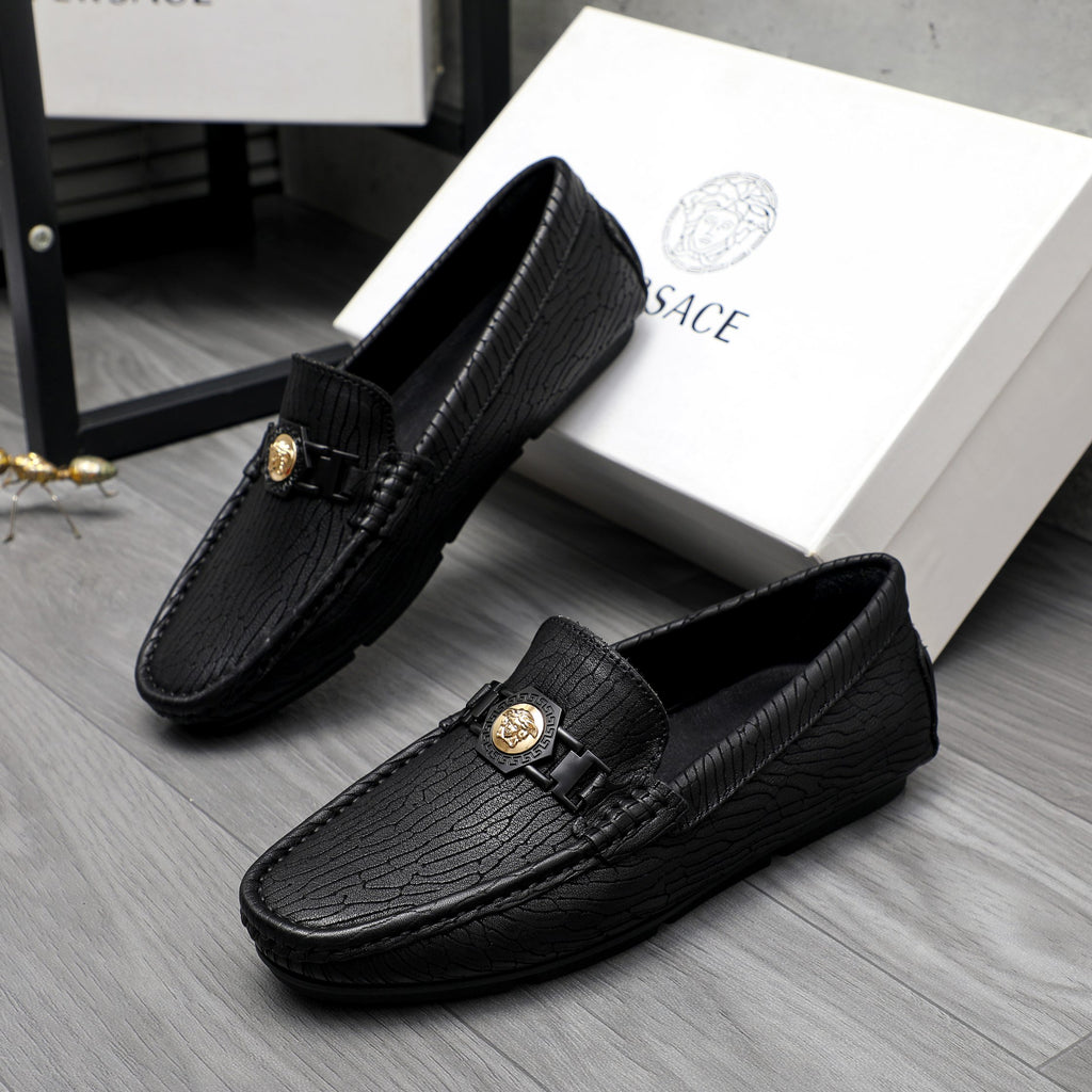 Versace luxury loafers, black embossed leather with square gold clasp