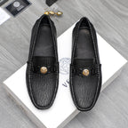 Versace luxury loafers, black embossed leather with gold buckle detail
