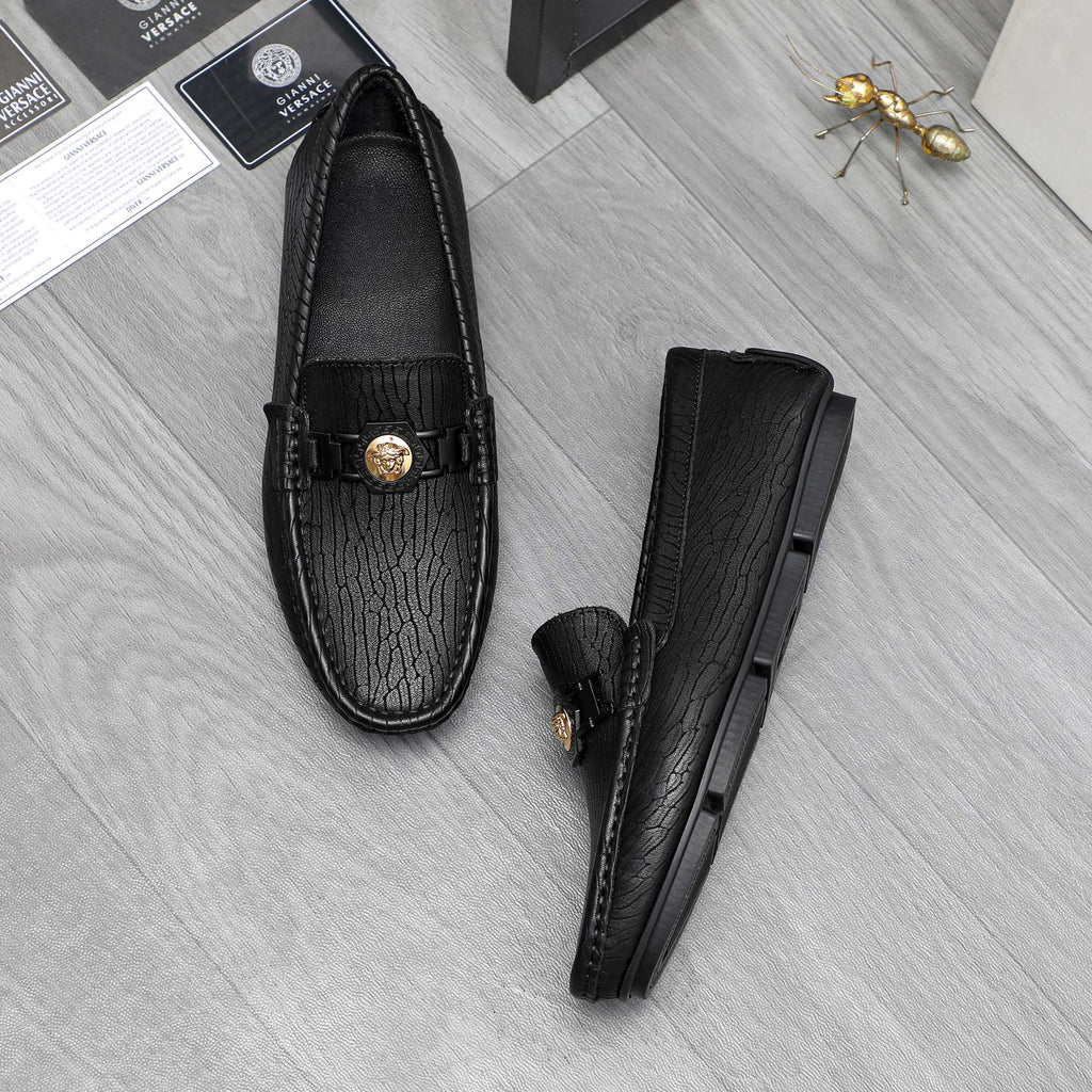 Versace luxury loafers, black embossed leather with gold buckle and strap