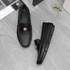 Versace luxury loafers, black embossed leather with gold buckle and strap