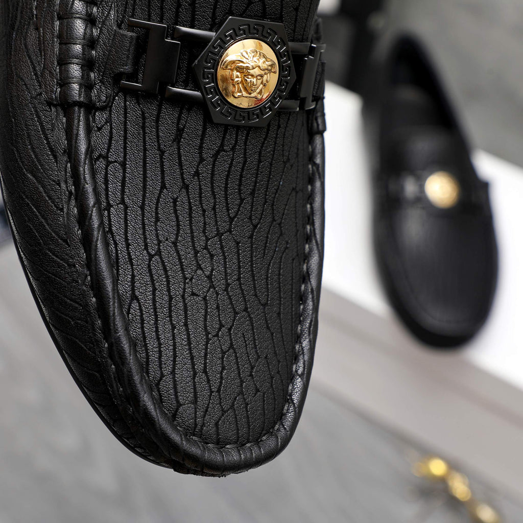 Versace luxury loafer, black embossed leather with gold logo buckle