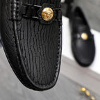 Versace luxury loafer, black embossed leather with gold logo buckle