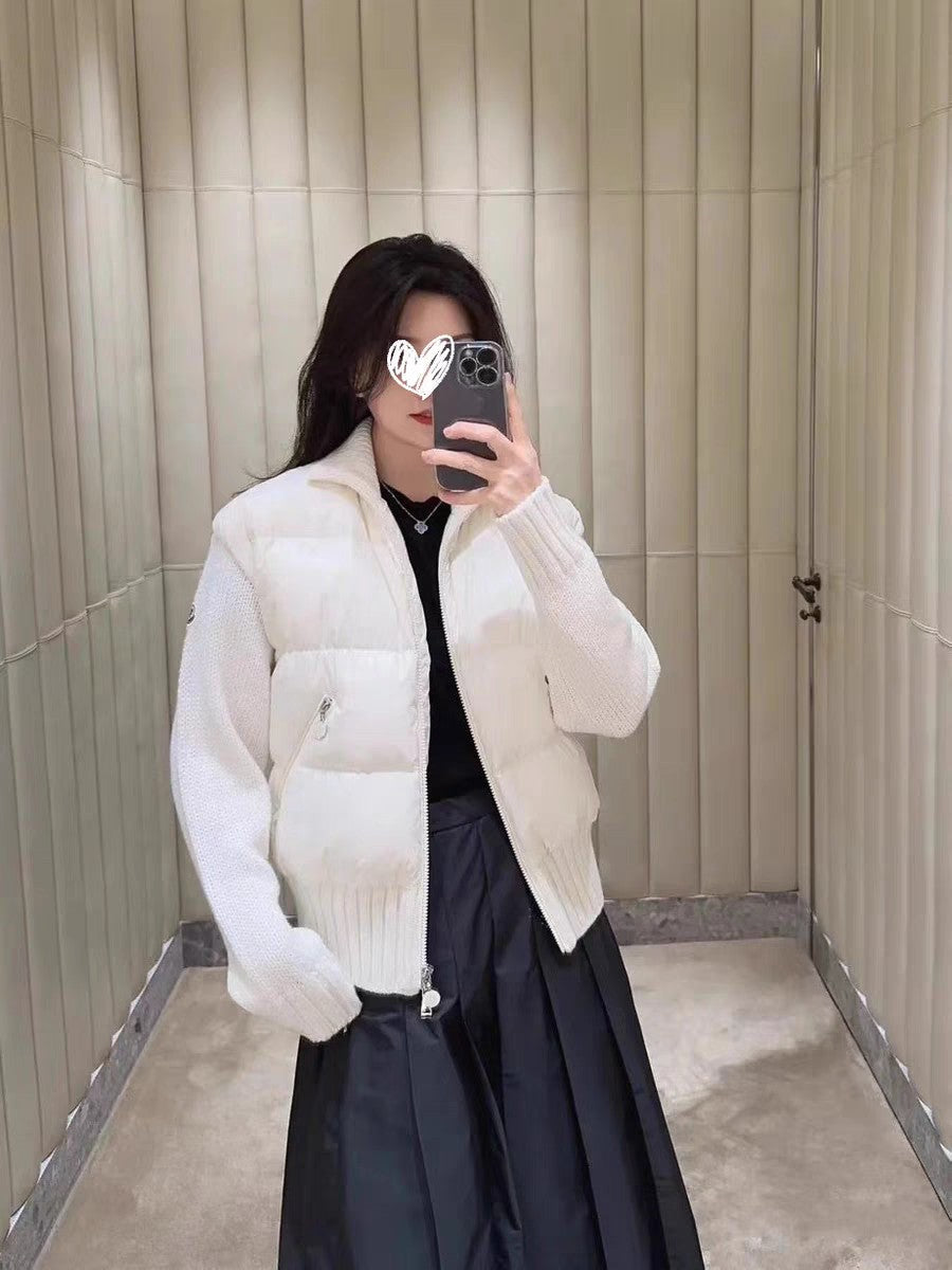 Moncler white puffer jacket with zip front and knit trim at cuffs and hem.