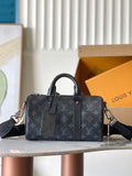 Louis Vuitton monogram top-handle handbag in dark gray with leather straps