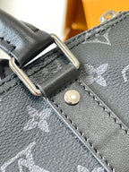 Louis Vuitton handbag strap close-up with silver ring and stitched leather trim