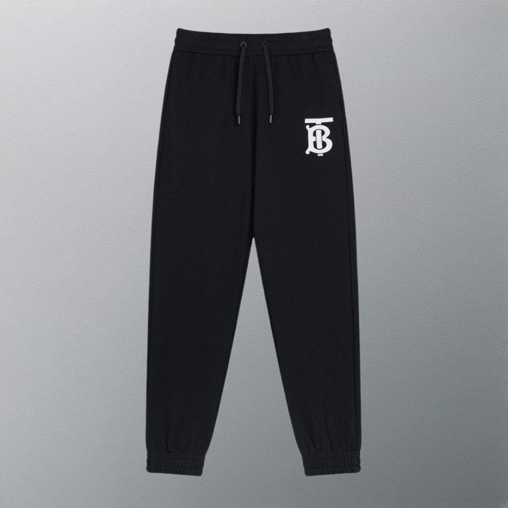 Black Burberry logo track pants with drawstring waist and ribbed cuffs