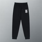 Black Burberry logo track pants with drawstring waist and ribbed cuffs