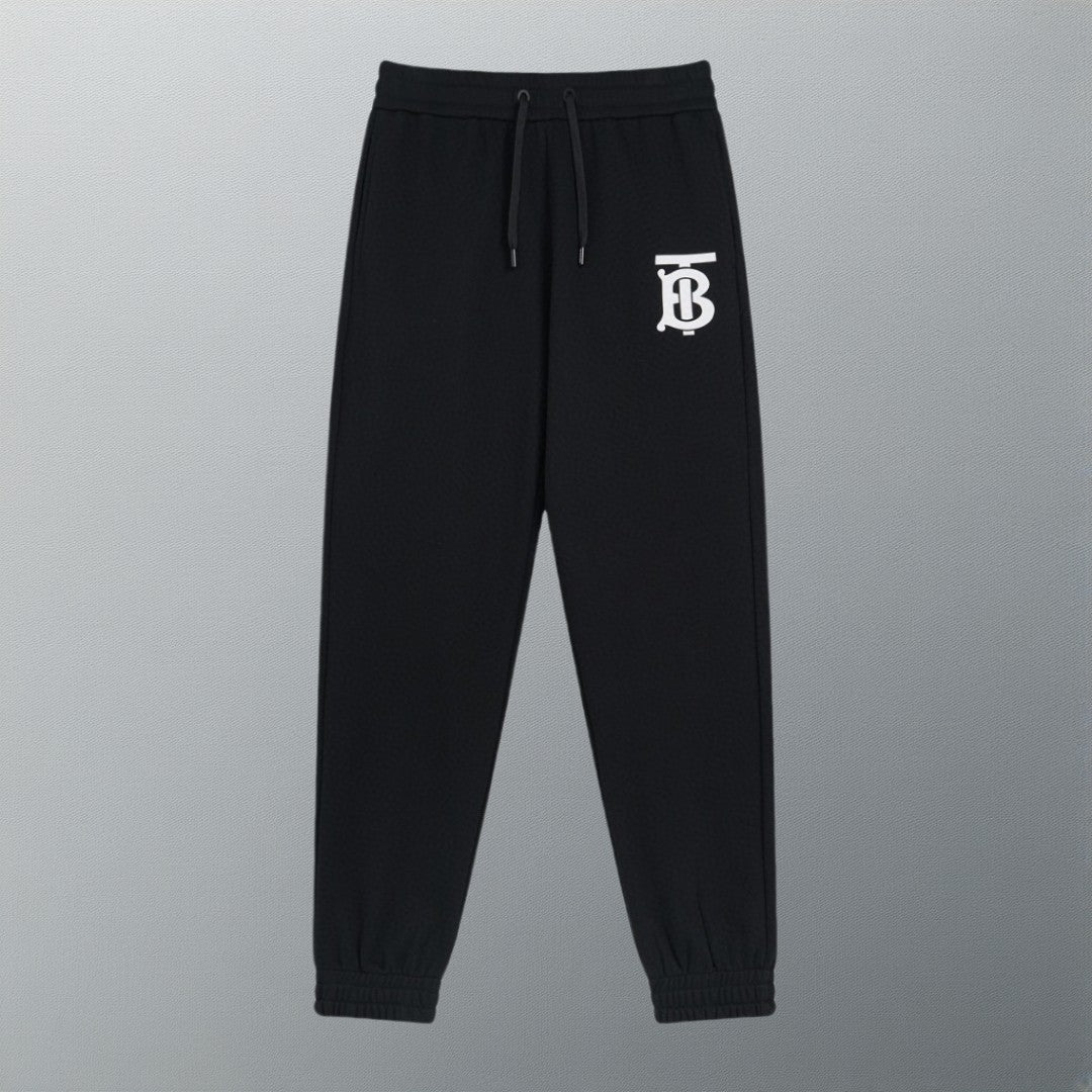 Black Burberry logo track pants with drawstring waist and ribbed cuffs