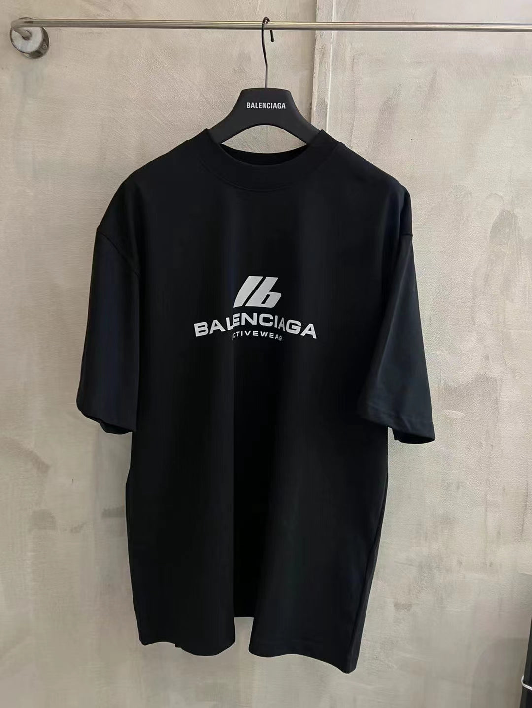 Black short-sleeve T-shirt with Balenciaga logo on chest