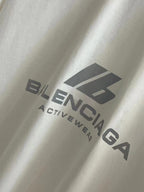 White T-shirt close-up with Balenciaga Activewear logo print