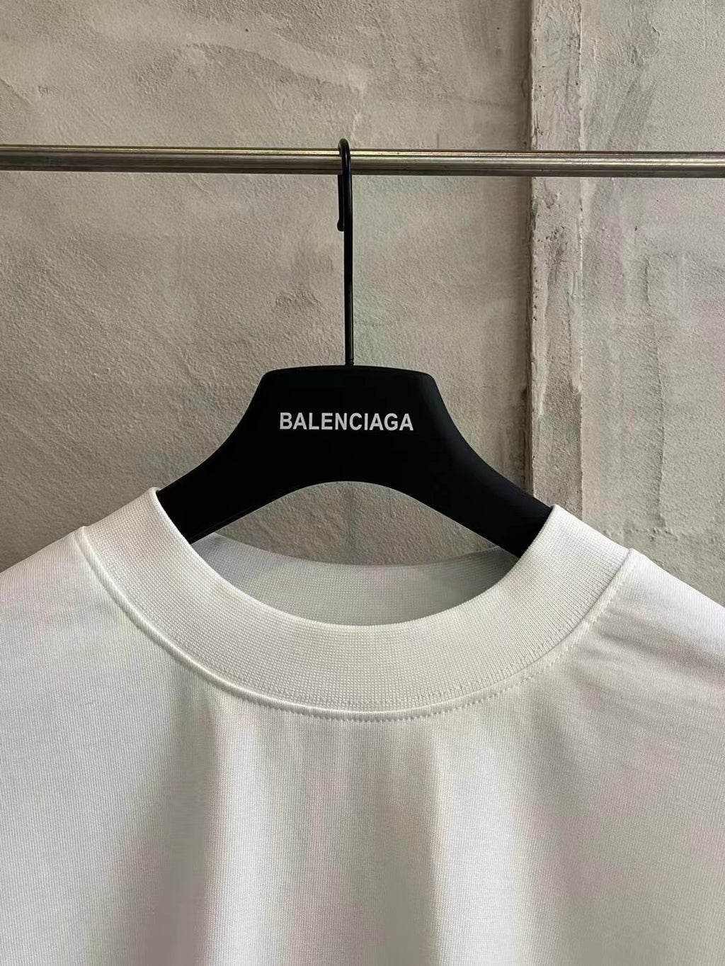 White crewneck T-shirt with Balenciaga label at collar