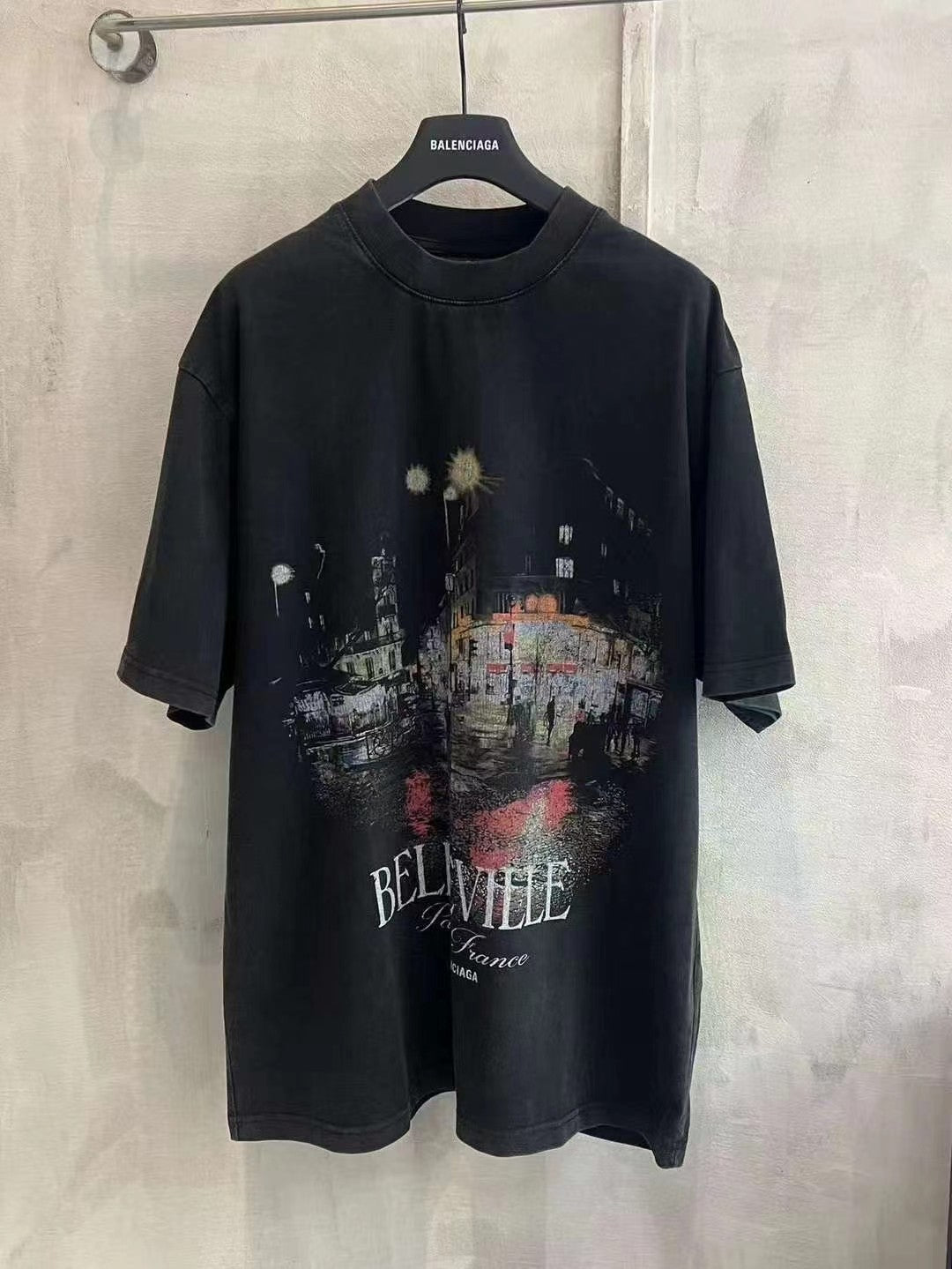 Black Balenciaga short-sleeve T-shirt with city graphic and “BELLEVILLE” lettering